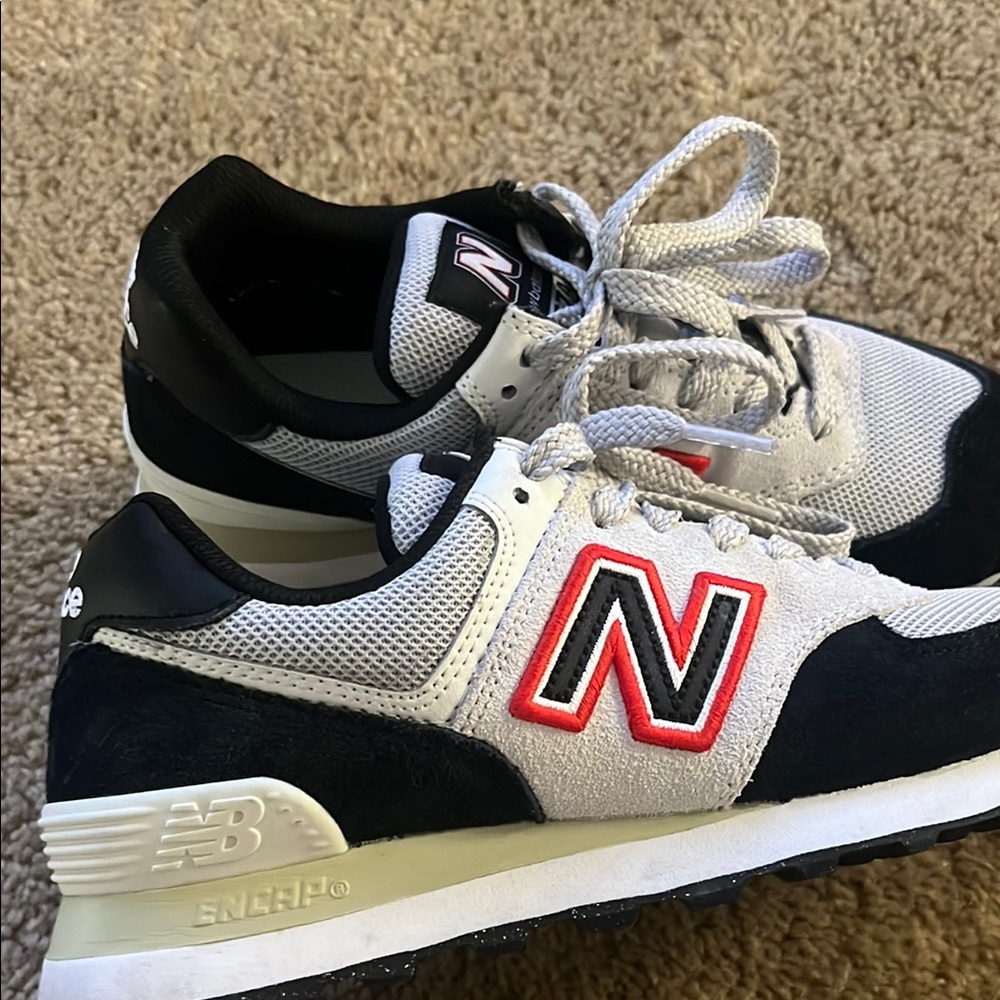 New Balance woman’s  Black and White new balance Sneakers